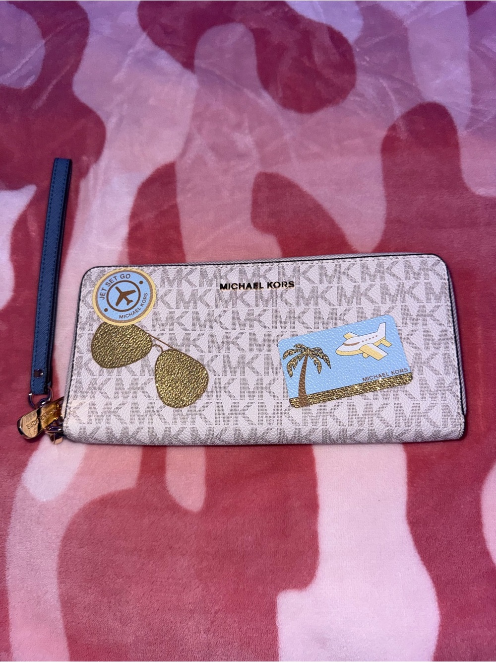 Michael Kors Beige MK Logo Zip Wallet with Gold Accents and Blue Travel Patches